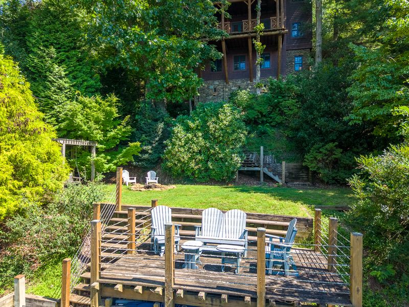 Lawn, fire pit, and lower deck seen from above